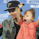 Golden State Warriors guard Stephen Curry is joined by his daughter Riley at a news conference after Game 5 of the NBA basketball Western Conference finals against the Houston Rockets in Oakland, Calif., Wednesday, May 27, 2015. The Warriors won 104-90 and advanced to the NBA Finals. (AP Photo/Ben Margot)